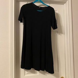 Black stretch knee length dress. Perfect to dress down or dress up